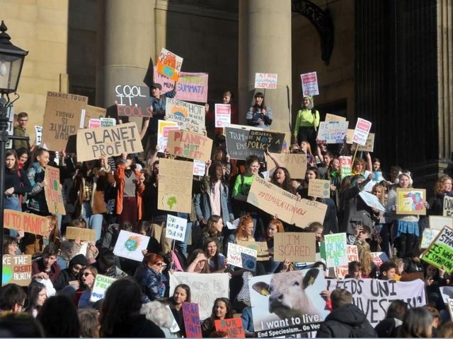 A photo of a large crowd of people from one strike outside Leeds town hall